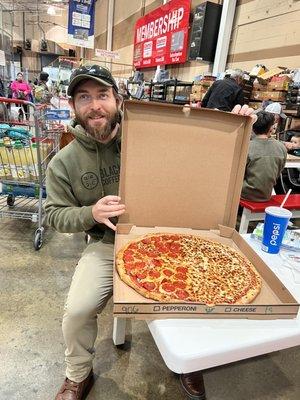 It's not a Costco trip if you don't take home a Costco pizza!