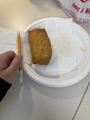 Egg roll, drenched in oil inside and out