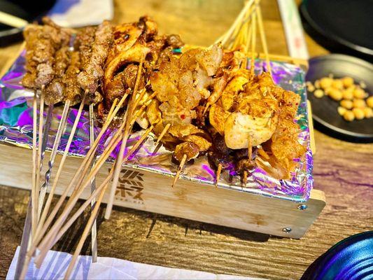 Chicken gizzards, tendons, cows throat, beef and lamb, pig intestines, squid and squid tentacles.