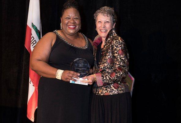 Michele Dobson receiving the 2017 Humanitarian of the year aware from CCEJ (California Councile of Equality and Justice )