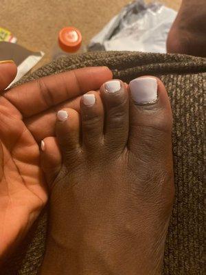 White gel polish pedicure .