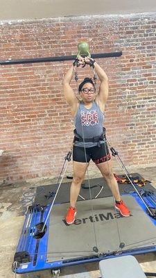 1 on 1 session on the Vertimax performing resistance training for weight loss