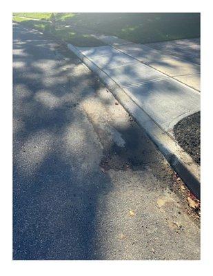 Picture showing it removed exposing how bad the curb is finished as well as the height of the curb