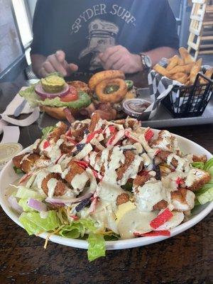 Cowboy burger and Fiesta salad with avocado dressing.