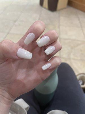 White acrylic nails in coffin shape