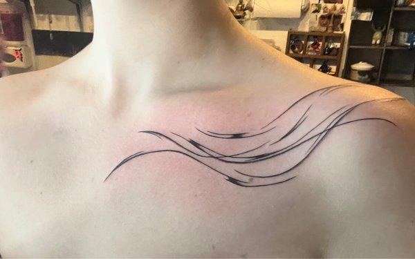 Collar bone tattoo