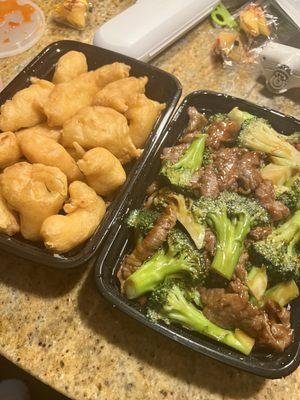 Beef with broccoli and sweet and sour chicken, absolutely delicious.  And veggie spring rolls.