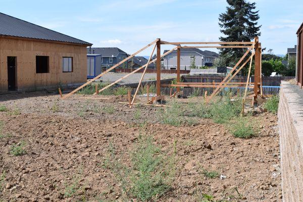 Covered play area posts in concrete