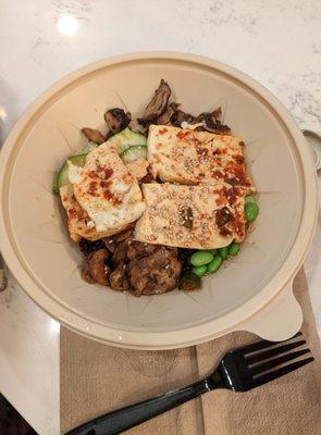 Bibimbap with spicy tofu, eggplant, mushroom, zucchini, edamame.