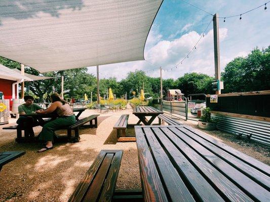 Another view from outdoor seating area. Lots of tables and chairs!