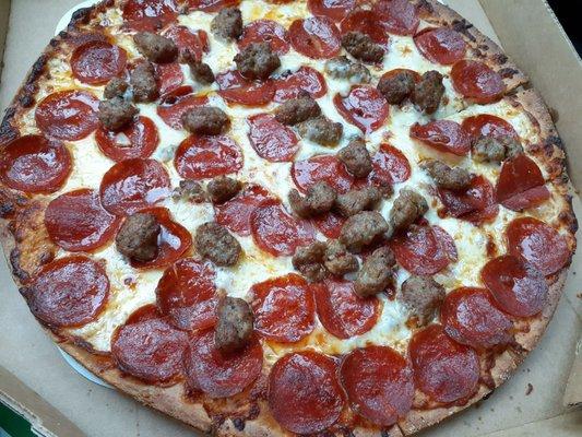 Thin crust, white sauce with pepperoni and Italian sausage