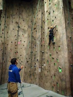 Kiddo's first climb, on one of the beginner walls