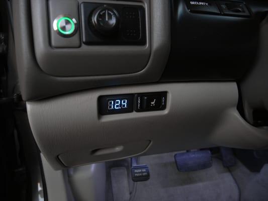 Voltage Meter read out, metal flush mount push button switch and accent led foot lights.