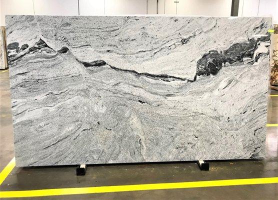 Viscount White granite is and interesting material that features a white under tone and black/grey veins.