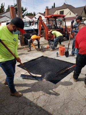 Sewer line repair in street. Asphalt repatch