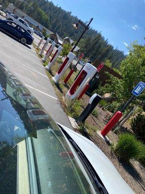 6 Tesla Chargers & 1 EV Charger available