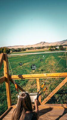 How far can YOU sling a pumpkin?