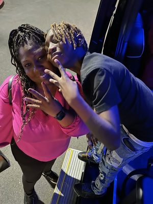 Me and my son Christian Isaiah taking a picture from the party bus as he leaves Top Golf the location of his 15th Birthday Party.