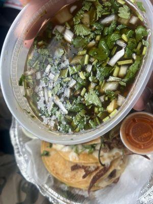 Birria tacos with the beef consomé (broth)