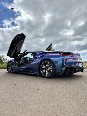 After, Rear side view of 2019 BMW i8 Roadster