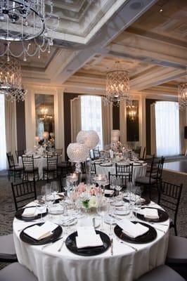 Tall crystal globes decorate the table