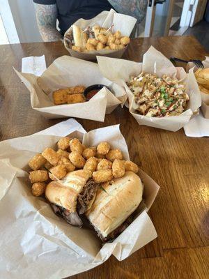 Tri-Tip Sandwich, Tator Tots, Chicken Nachos & Fried Ravioli.