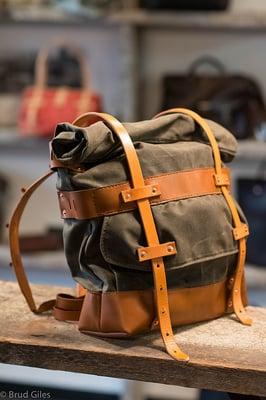 Our waterproof rucksack features waxed canvas and english bridle straps.