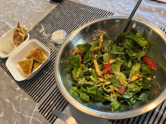 Santorini salad with chicken side of pita and spanakopita