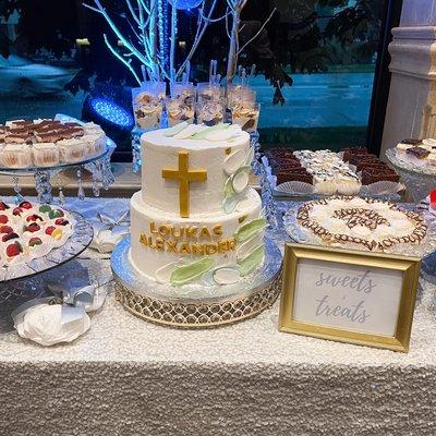 Baptism display with Daltons cake.