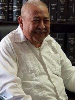 Mr. Omar Aguilar.  Over 40 years of Tax experience.