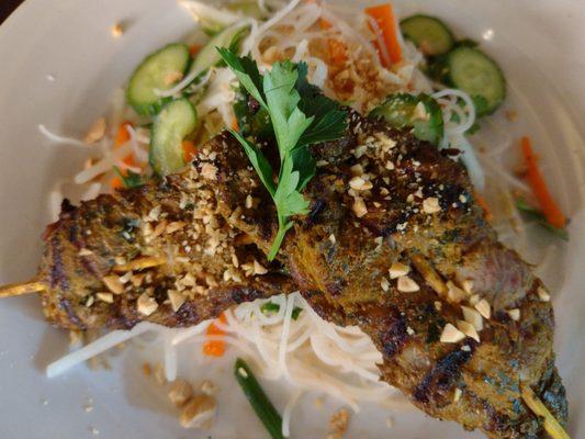 Beef curry skewers with noodle salad