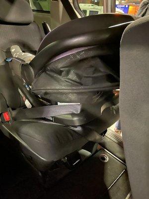 This is how they secure the car seat. SHAME. So many things are wrong here.