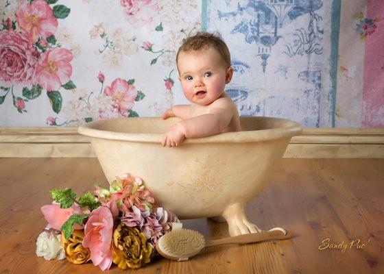 We LOVE babies and have hundreds of props, clothing and background options