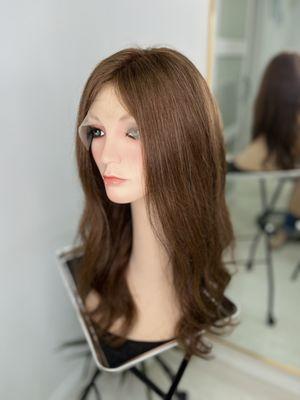 Medium warm brown Russian human hair wig.