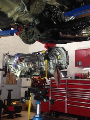 Dave's Auto Service of Boyertown, Pa. replacing a transmission in a car