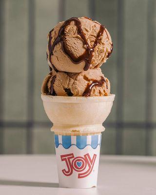 Homemade Coffee Ice Cream served in a wafer cone.