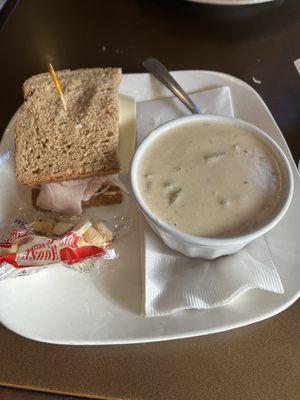 1/2 Turkey Sandwich on wheat with a cup of clam chowder.