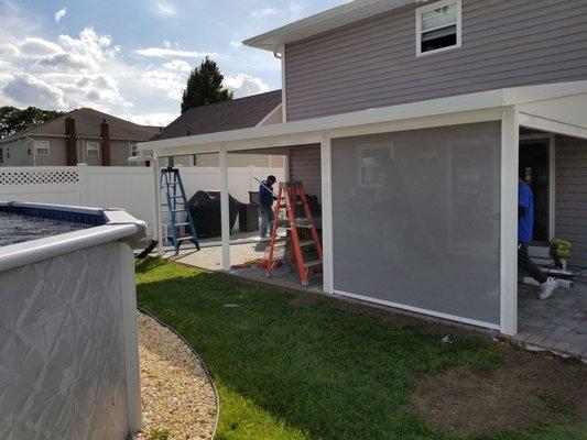 Adding screen solar shades will help block harmful UV rays, block the rain and snow.