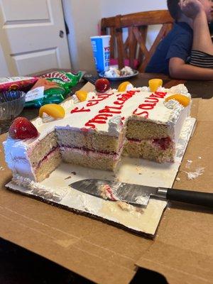 Fantastic Tres Leches Layer Cake with Strawberry filling and fruit topping