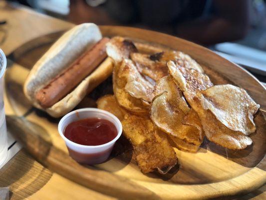 Happy hour hot dog! Chips were crispy and delicious !