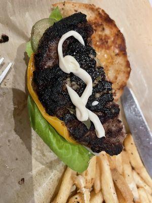 Bottom of burnt classic burger