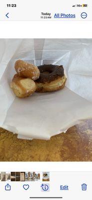 Two FREE Glaze Round Donut Holes, and Chocolate Round Donut.