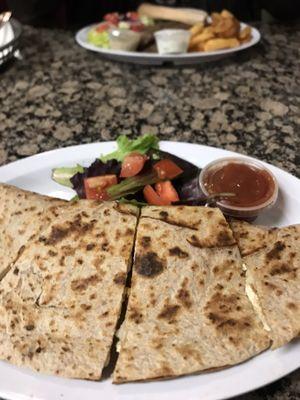 Soy quesadilla in the front. Gyro plate w/ lamb in the back that friend said was good.