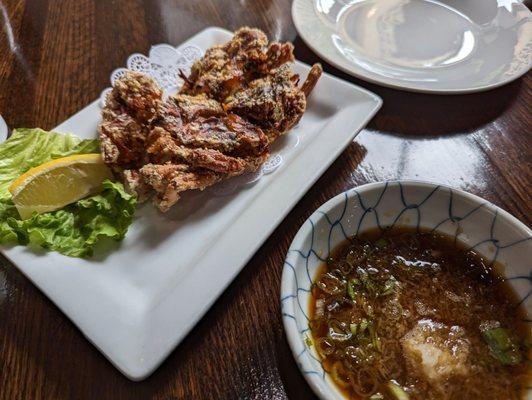 Soft shell crab with sauce on the side.