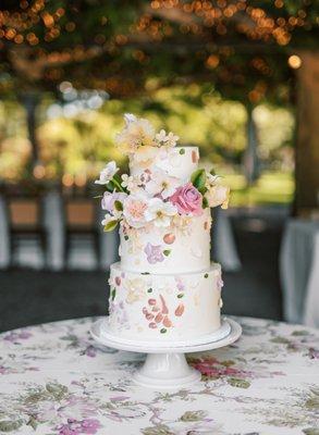 Our beautiful wedding cake by Palette Cakes. Photo by Janine Licare.