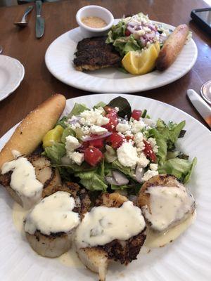 Scallops in foreground, blackened Grouper in back of photo. It was amazing.