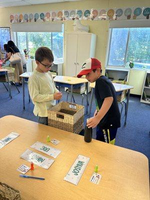 Organizing their desks.