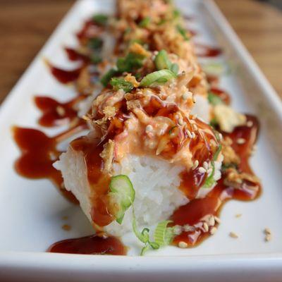 Kanikama Sushi Bites come topped with savory teriyaki sauce and crunchy fried onions!