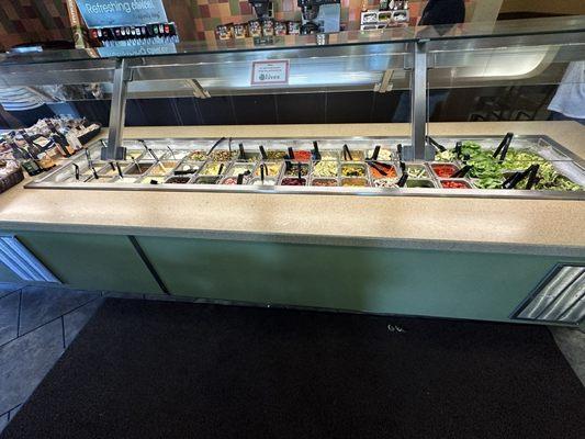 Salad bar. Lots of fresh vegetable choices, as well as dips, potato/pasta salad, pickles, olives and more.