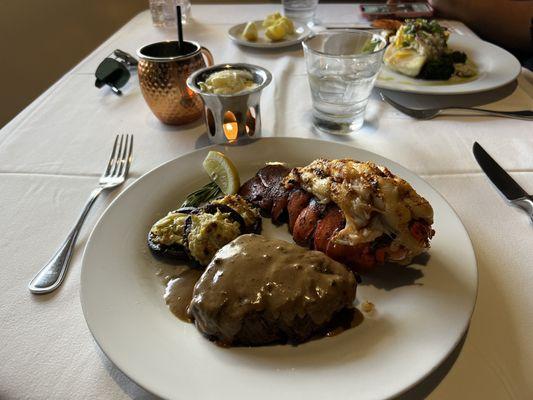 Surf and turf.  8 oz filet with lobster tail & artichoke stuffed mushrooms.